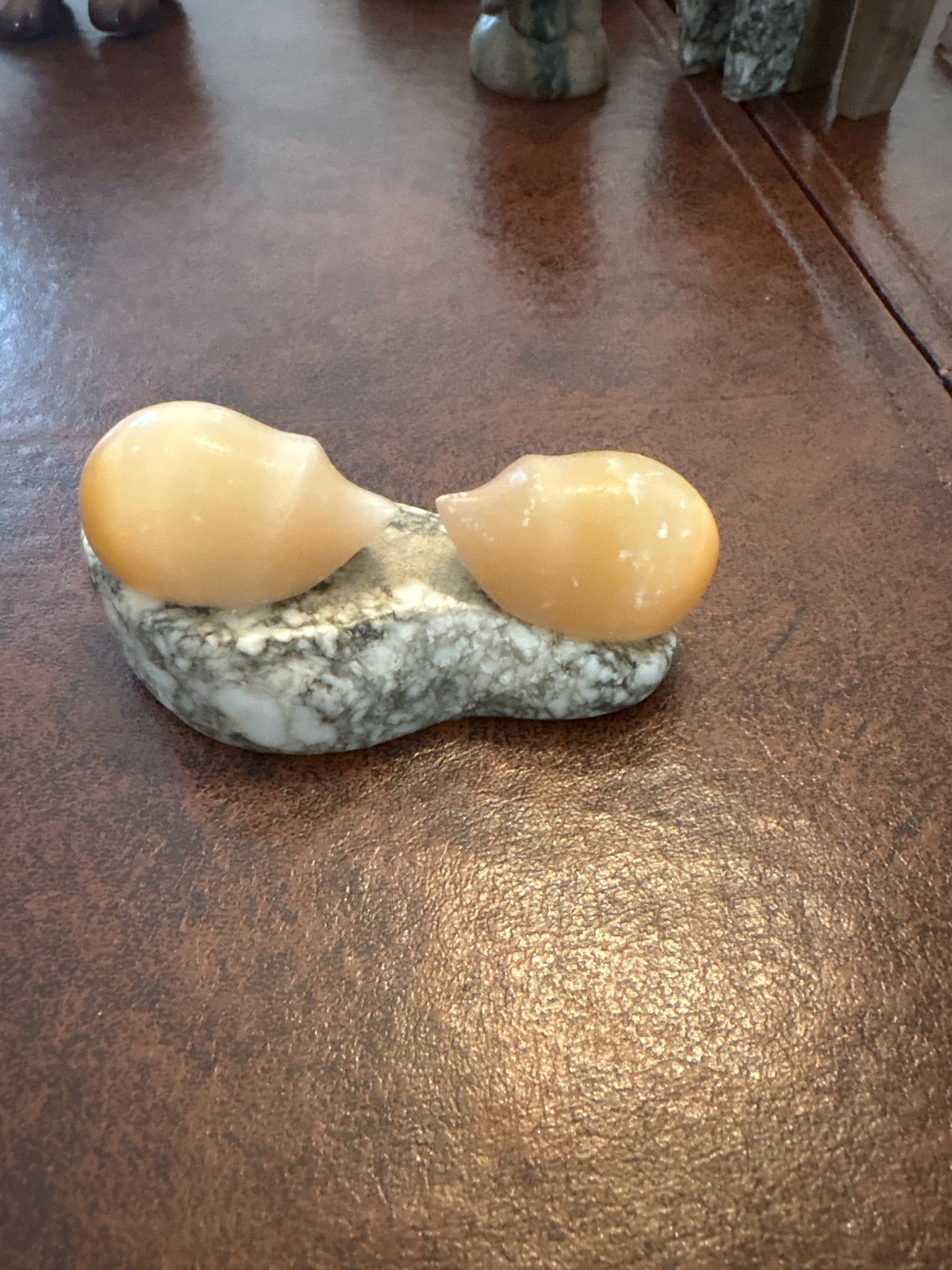 soap stone birds and hedgehog figurines