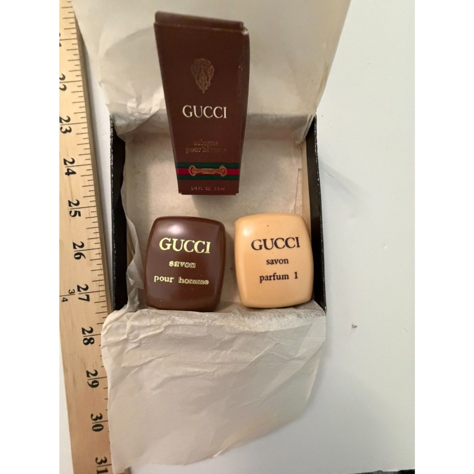 Vintage Gucci soaps and perfume bottle