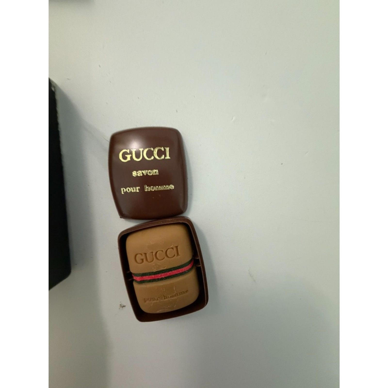 Vintage Gucci soaps and perfume bottle