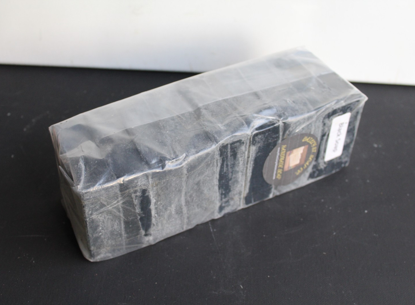 Black handmade soap loaf 9 Precut square bars