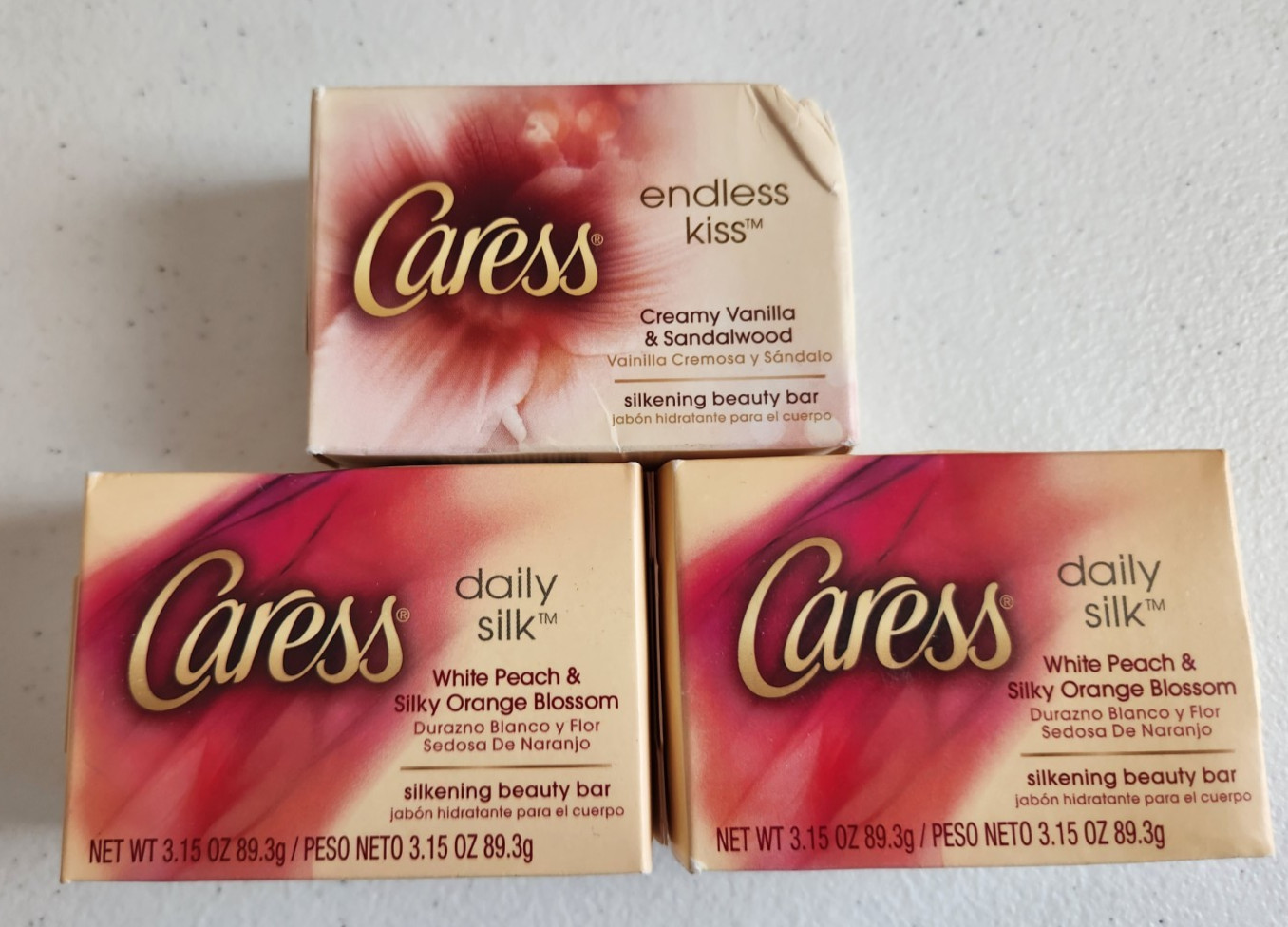 1 Caress Endless Kiss Creamy Vanilla & Sandalwood 2 White Peach & Orange Blossom