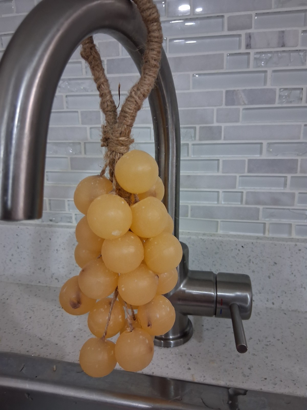 Handcrafted clear glycerin soaps shaped like grape clusters