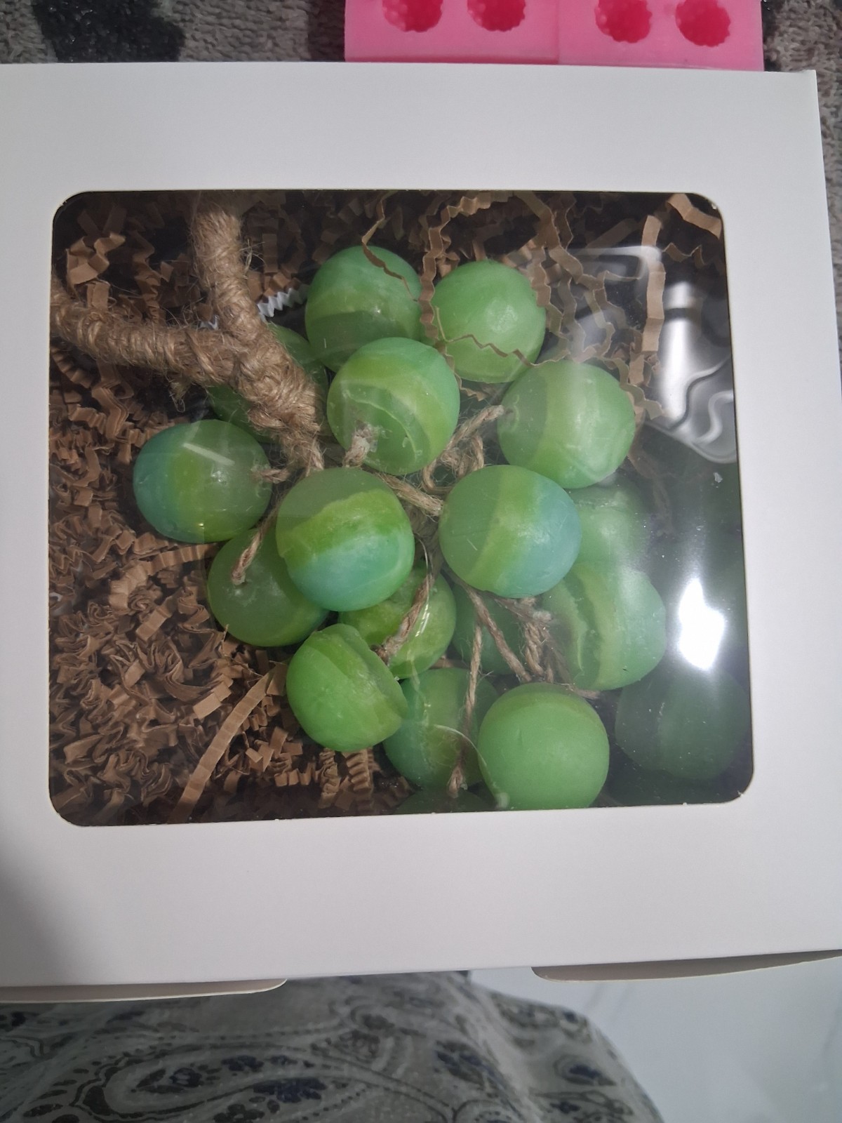 Handcrafted clear glycerin soaps shaped like grape clusters
