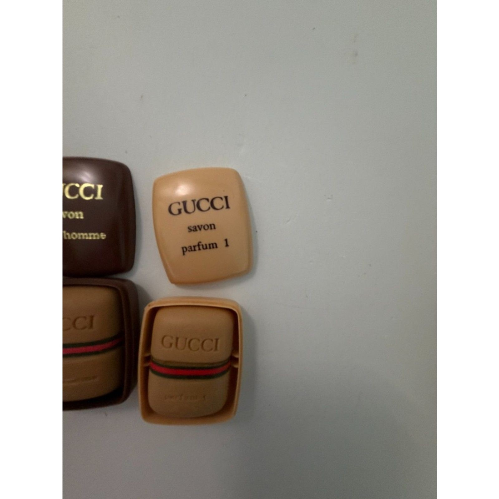 Vintage Gucci soaps and perfume bottle